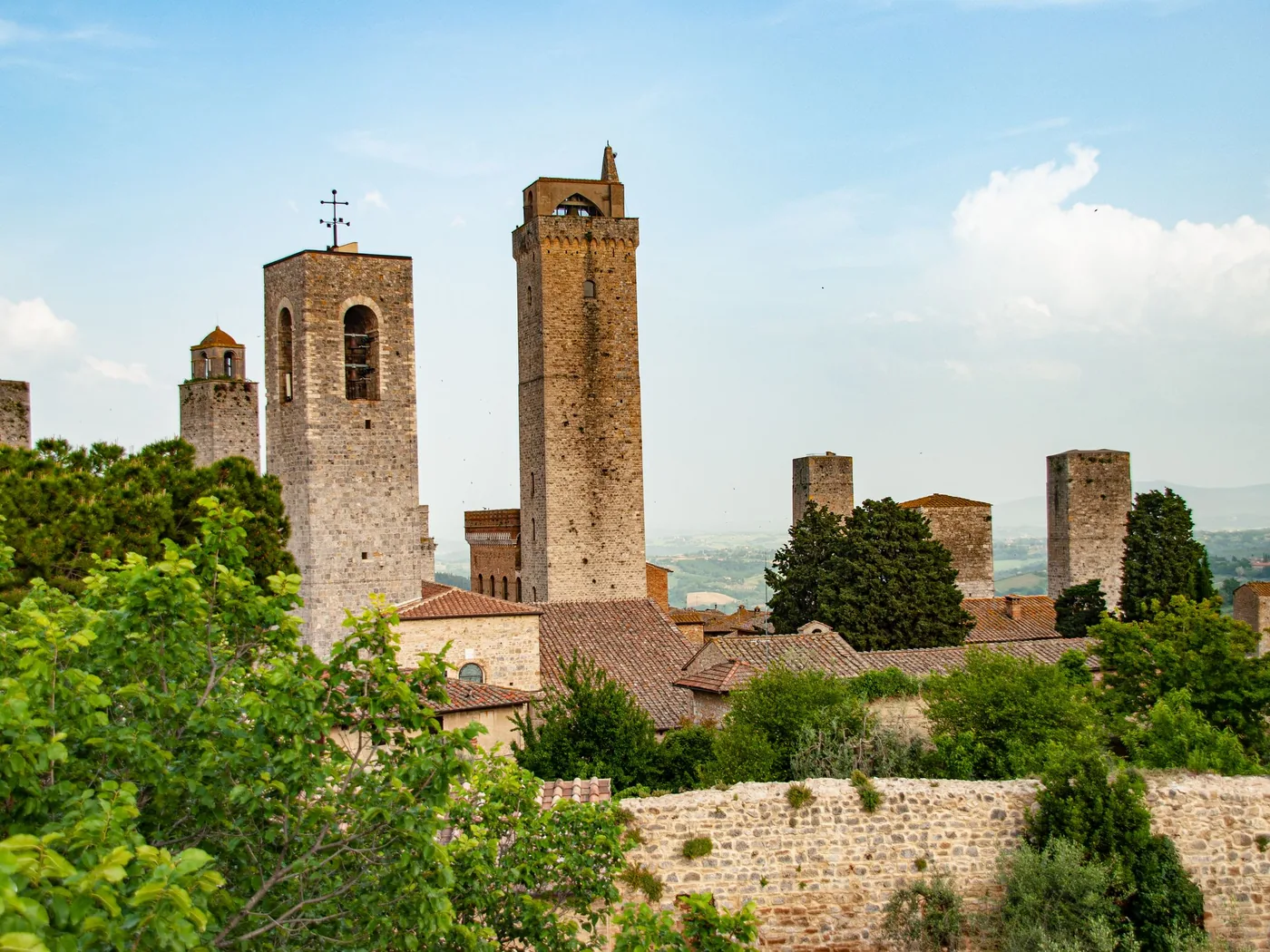 The medieval towers of San Gimignano against a blue sky